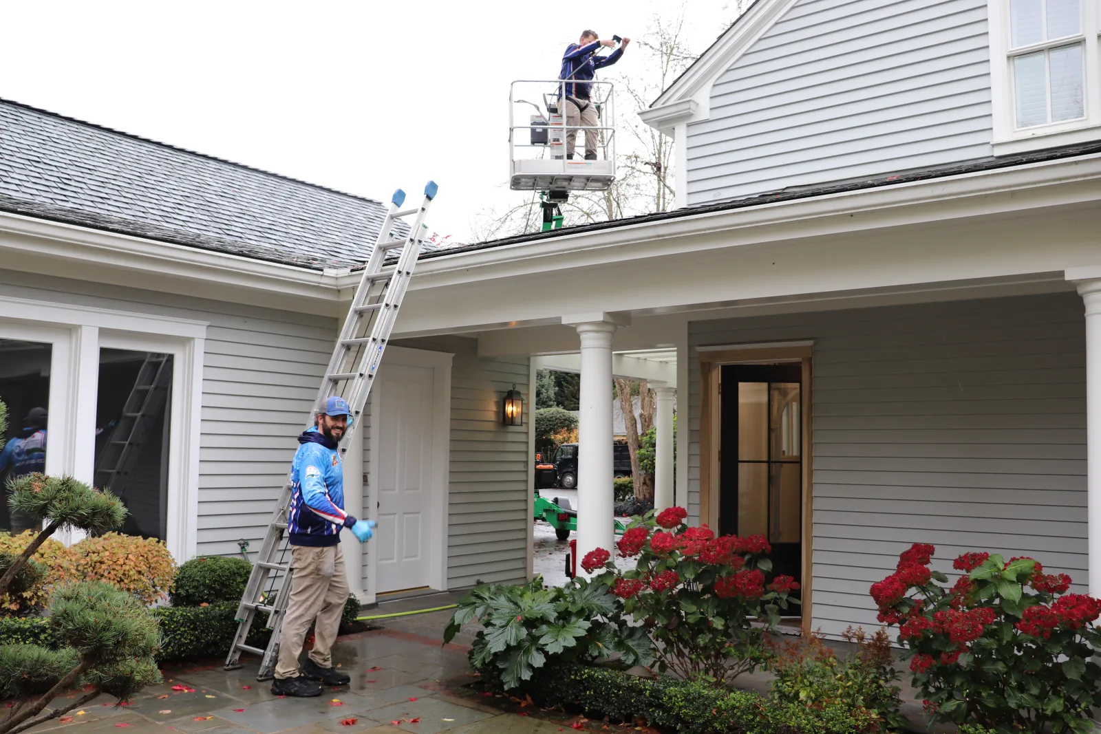 Homefront Power Wash crew washing a home exterior (verify)