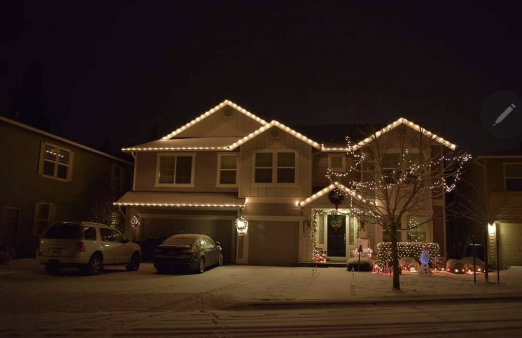 Professional holiday light display installed on a home by Homefront Holiday Lights in the Seattle/Eastside area